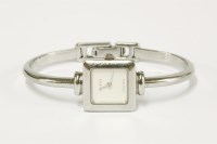 Lot 222 - A ladies stainless steel Gucci 1900L quartz bangle watch