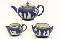 Lot 351 - A Wedgwood blue and white jasperware three piece tea set