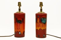 Lot 620 - A pair of Poole pottery Delphis pattern table lamps