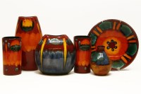 Lot 607 - A collection of Delphis Poole pottery