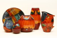 Lot 556 - A collection of Delphis Poole pottery