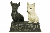 Lot 411 - A Buchanan's black and white whisky advertising figure