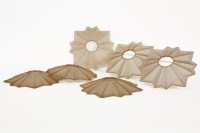 Lot 458 - A set of six tinted glass star moulded shades