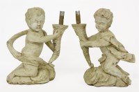 Lot 653 - A pair of carved cherub lights