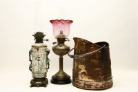 Lot 592 - A Victorian pottery and gilt mounted oil lamp