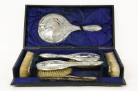 Lot 299 - A six-piece silver-backed dressing table set