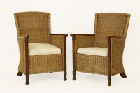 Lot 792 - A pair of rattan armchairs