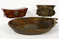 Lot 450 - A carved wooden olive oil bowl