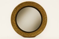 Lot 672 - A Regency circular wall mirror