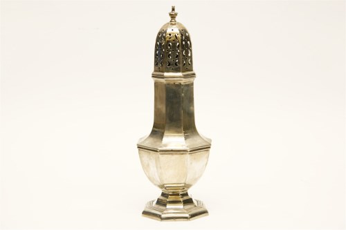 Lot 318 - A silver caster of faceted form