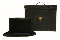 Lot 542 - A silk top hat in original box