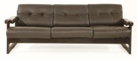 Lot 497 - A three-seater leather sofa