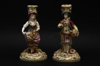 Lot 367 - A pair of mid 19th century Minton porcelain figural candlesticks