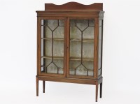 Lot 713 - An Edwardian inlaid mahogany display cabinet