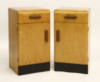 Lot 285 - A pair of bird's-eye maple and walnut bedside cabinets