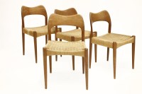 Lot 504 - A set of four teak chairs