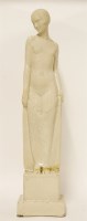 Lot 128 - A pottery figure of a lady standing on a plinth