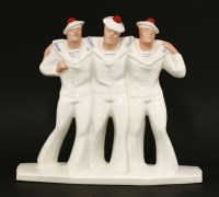 Lot 115 - A ceramic group of three jolly sailors