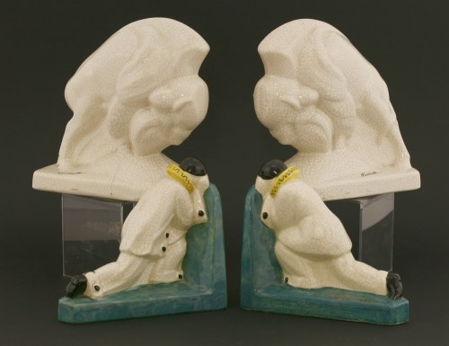 Lot 123 - A pair of pottery bison bookends
