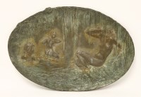 Lot 66 - An oval patinated plaque