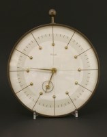 Lot 568 - A brass wall clock