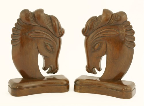 Lot 192 - A pair of carved wood horse head bookends