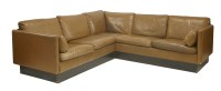 Lot 523 - A Danish brown leather corner sofa