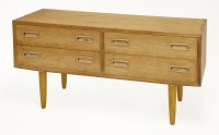 Lot 653 - A Danish light oak four-drawer chest