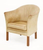 Lot 519 - A Danish tan leather tub chair