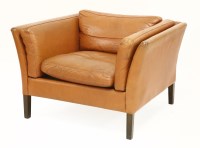 Lot 467 - A Danish tan leather armchair