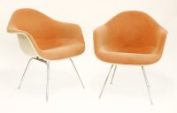 Lot 449 - A pair of shell lounge chairs