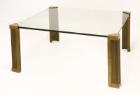 Lot 597 - A T14 glass coffee table