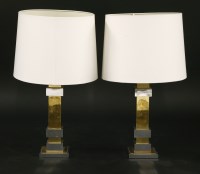 Lot 578 - A pair of French chrome and brass table lamps