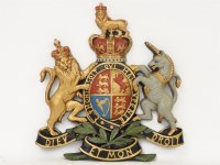 Lot 554 - A Composition Royal warrant/crest