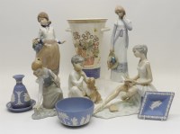 Lot 437 - A Lladro figure of a girl picking flowers