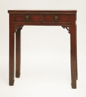 Lot 254 - A Chinese red lacquered coffer table