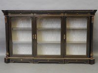 Lot 595 - A Victorian ebonised walnut and brass inlaid credenza