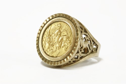 Lot 10 - A 1902 half sovereign in a 9ct gold channel set ring mount