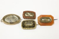 Lot 39 - Four memorial brooches