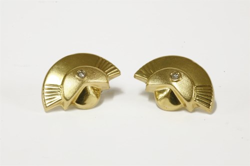 Lot 26 - A pair of Italian gold crescent shape single stone rub set diamond earrings