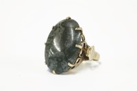 Lot 8 - A 9ct gold single stone agate cabochon ring