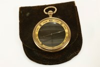 Lot 43 - A 9ct gold open glass compass pocket watch style