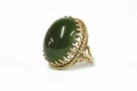 Lot 20 - A 9ct gold single stone oval nephrite cabochon ring
12.29g