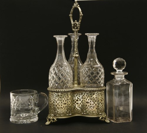 Lot 281 - A silver plated bottle stand