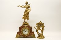 Lot 324 - A gilt spelter and marble figural mantel clock