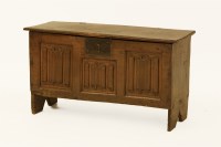 Lot 650 - An antique oak coffer