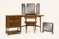 Lot 610 - A 1970s teak corner dressing table