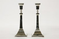 Lot 134 - A pair of silver candlesticks