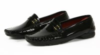 Lot 1442 - A pair of Salvatore Ferragamo black patent leather loafer-style shoes