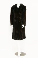 Lot 1411 - A dark brown mink fur coat